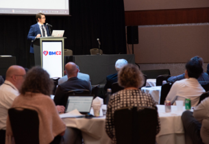 Dr. Nick Osborne presents to a room of BMC2 Vascular Surgery participants at the Radisson at Kalamazoo Center on May 1st, 2024.
